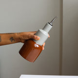 Oil pourer